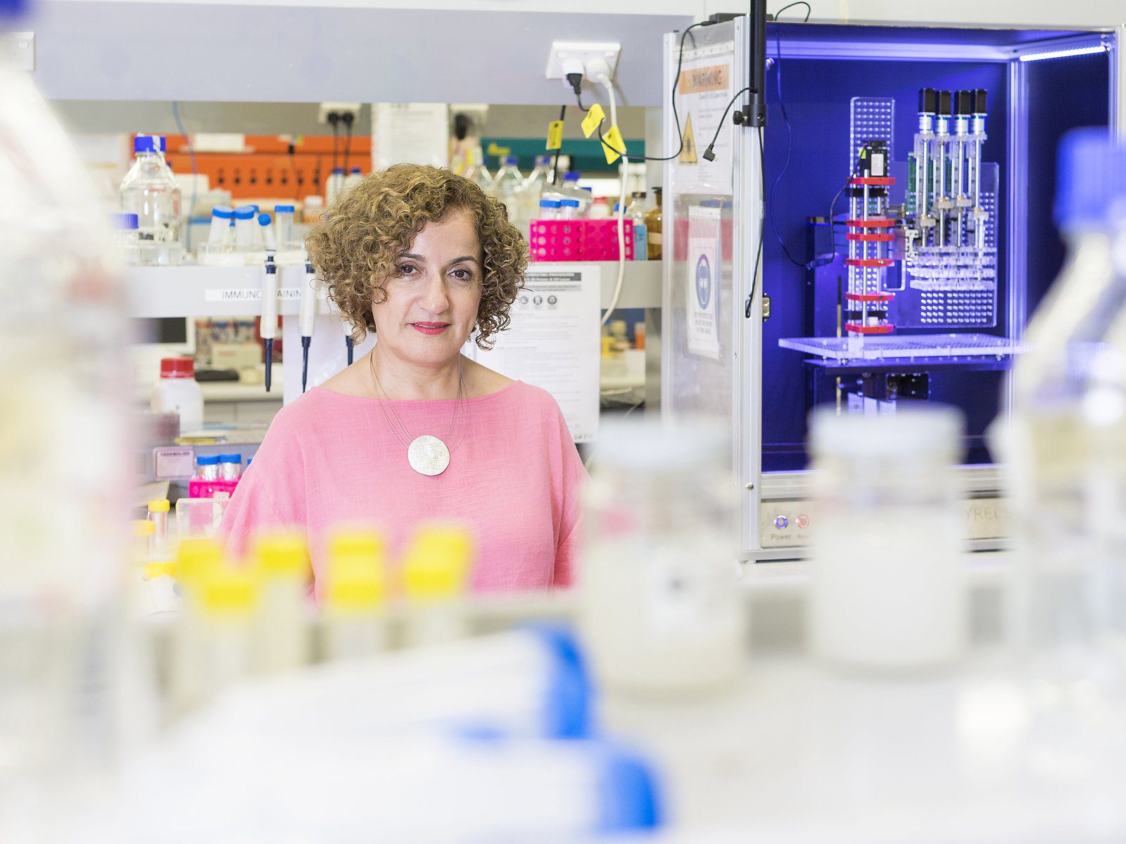 Professor Hala Zreiqat stands in a clinical lab.